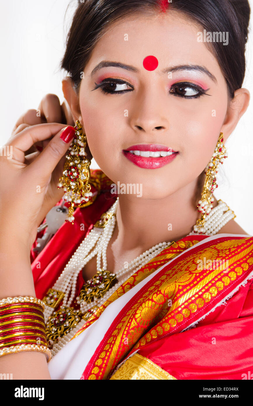 a woman in traditional indian attire poses for a photo. AI-Generated  32602276 Stock Photo at Vecteezy