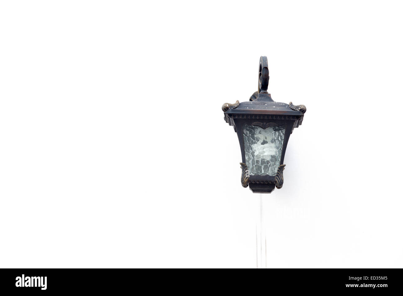Old-fashioned wall street lamp isolated on white Stock Photo