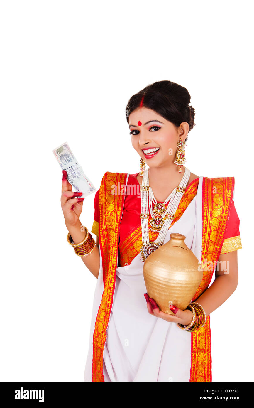 1 South indian Housewife lady saving money Piggy Bank Stock Photo - Alamy