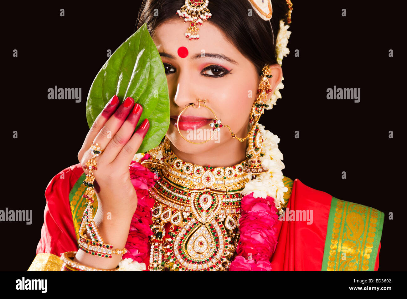 Indian woman sari hiding face hi-res stock photography and images - Alamy