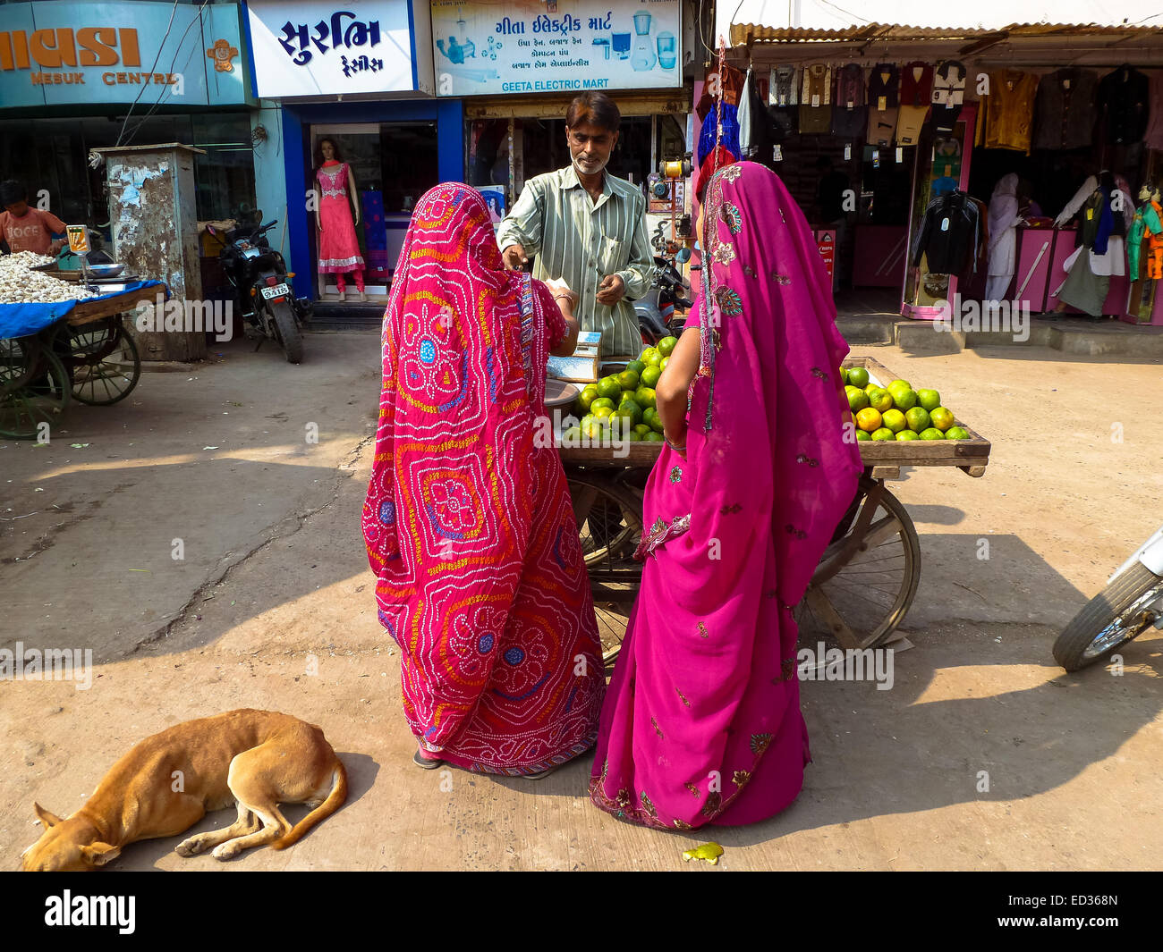 two women in colorful sari at the streets of bhuij gujarat india Stock Photo