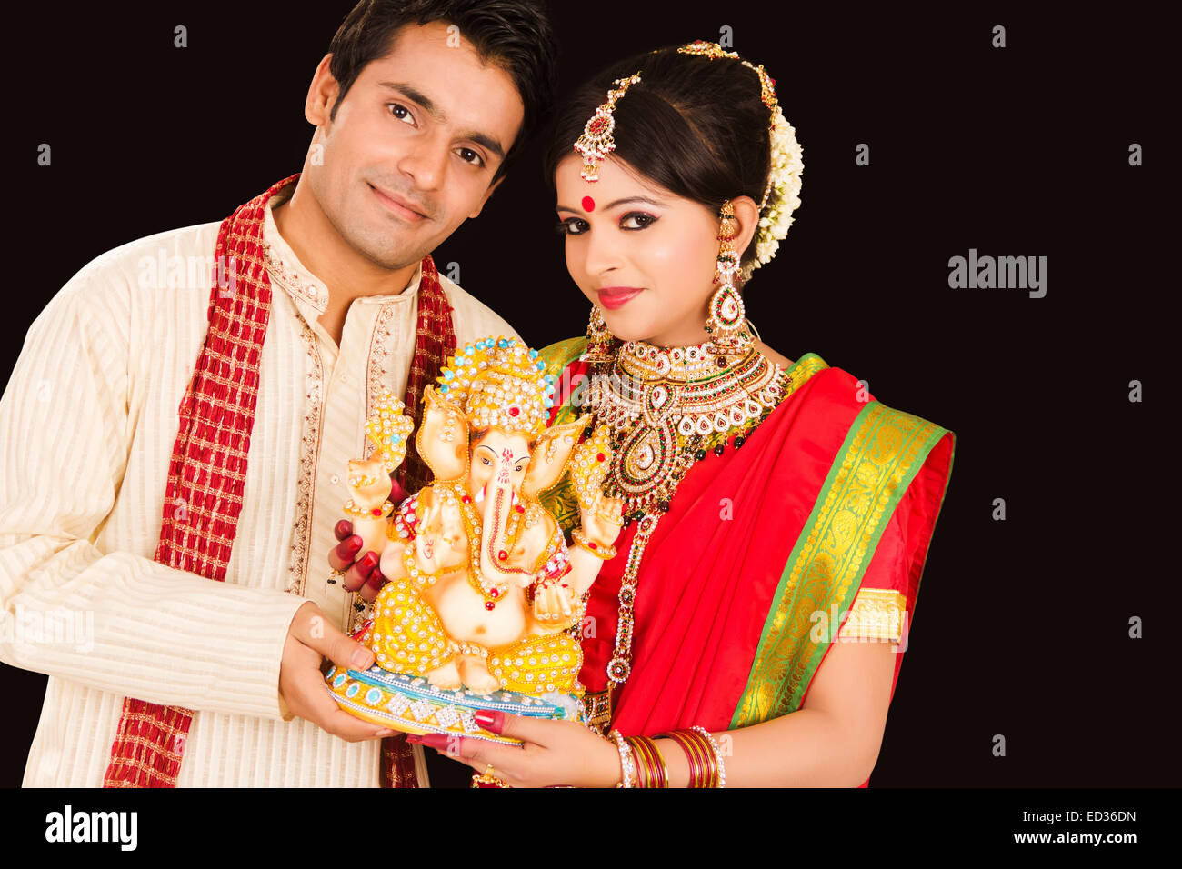 2 Bengali married couple Ganesh Chaturthi Worship Stock Photo
