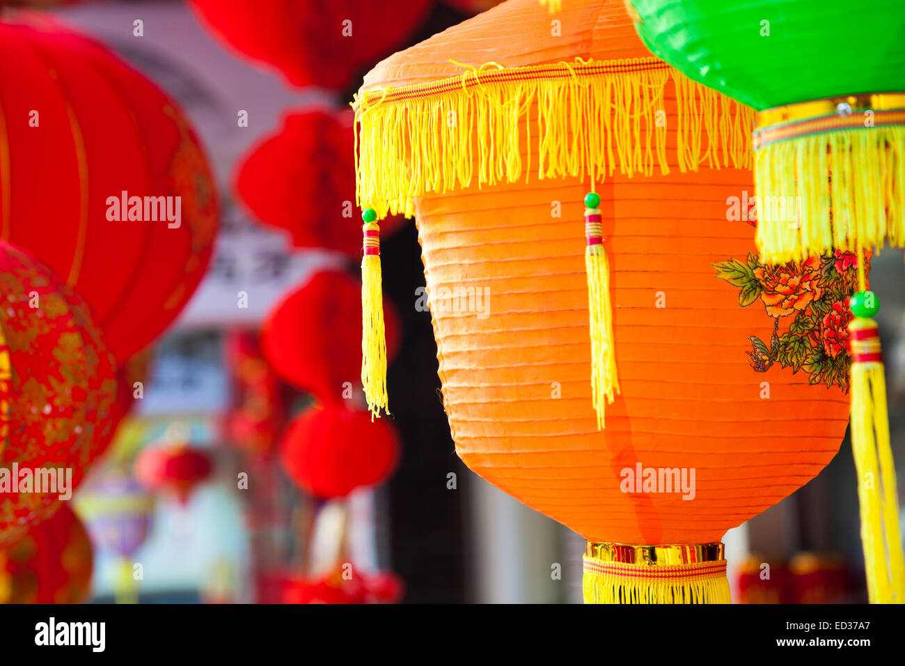 Colorful Chinese paper lanterns hanging in a street martket prepared