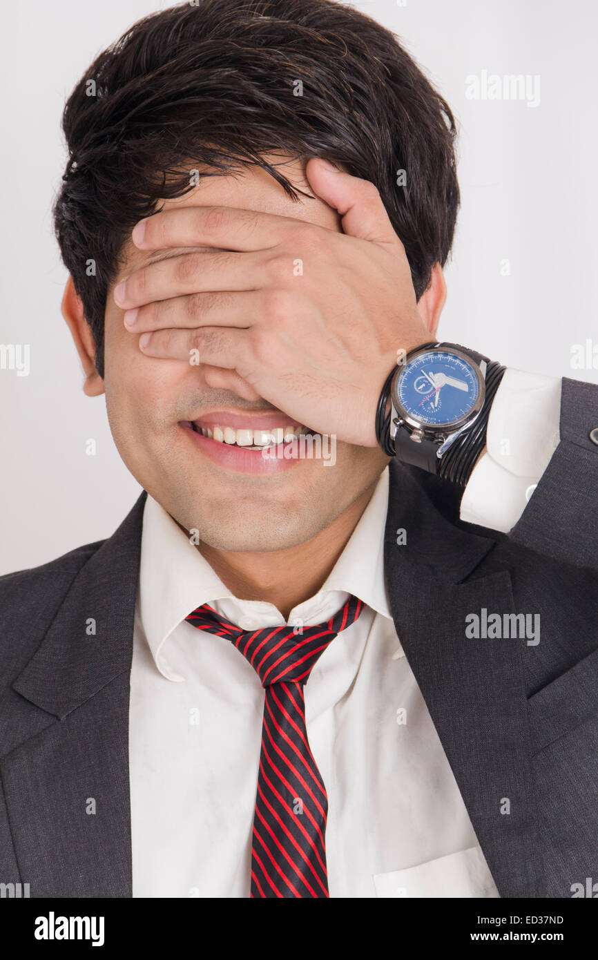 1 indian Business Man Covering Eyes Stock Photo