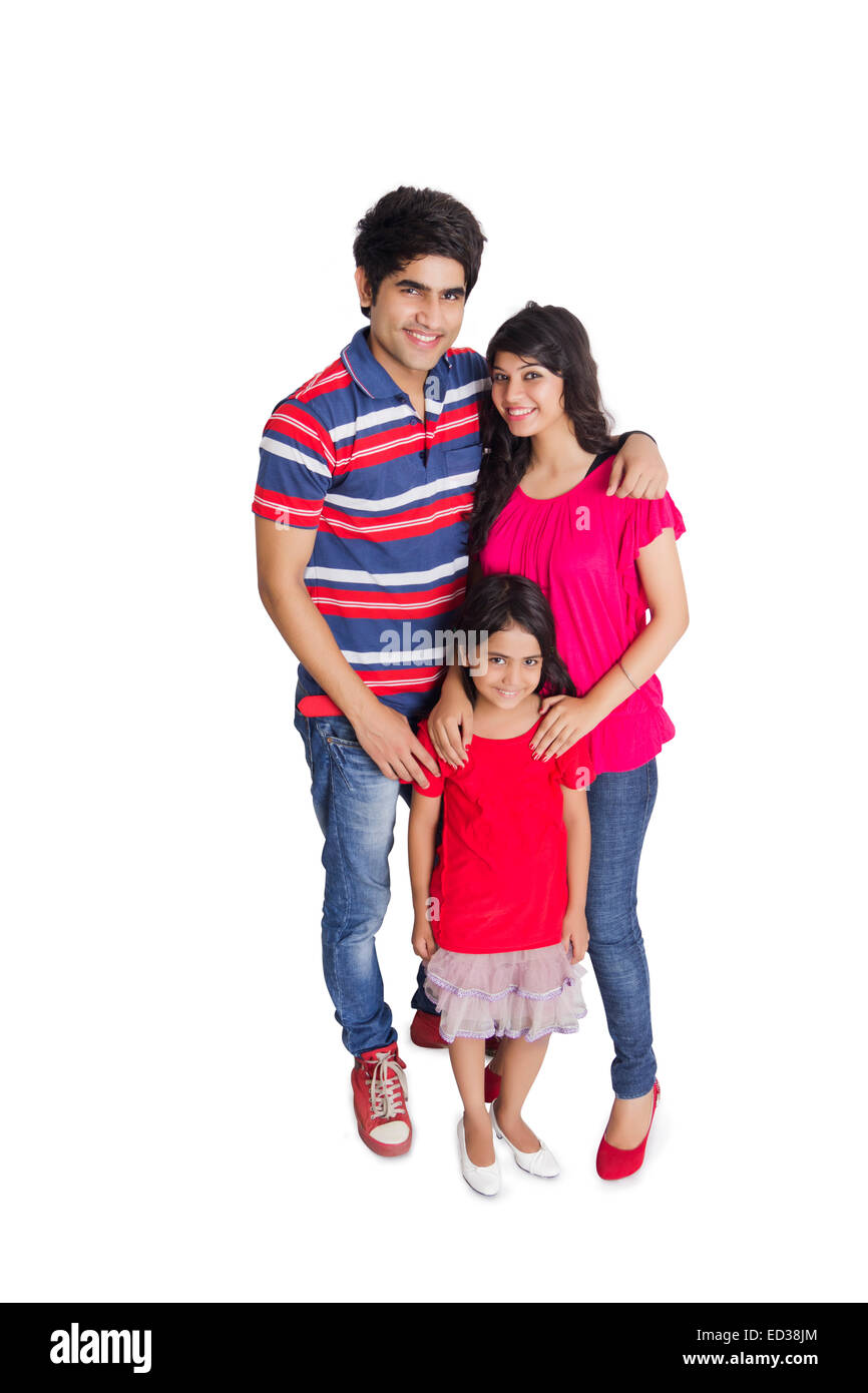 indian Parents and daughter standing pose Stock Photo