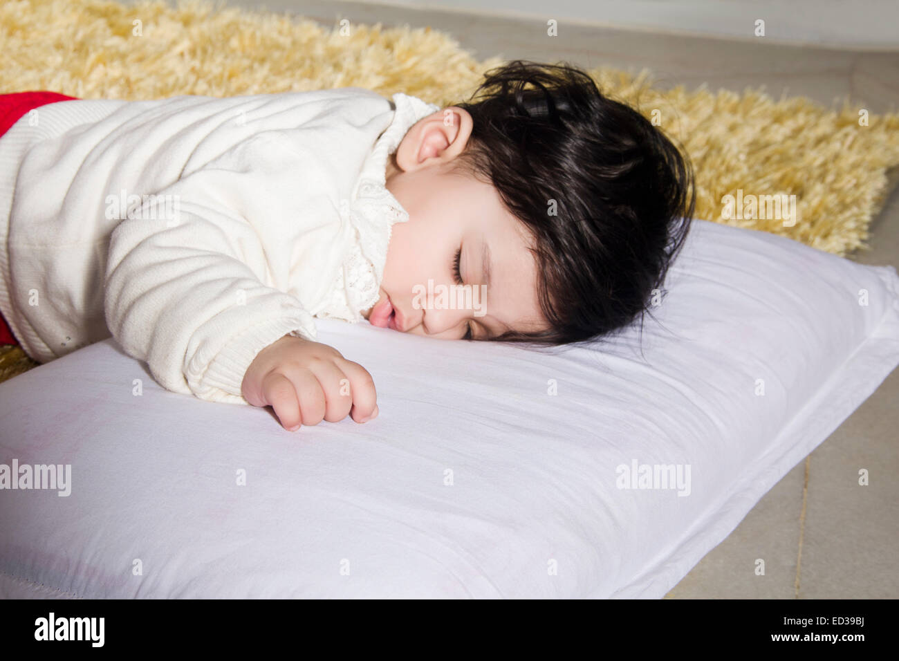 Black baby sleeping on bed hi-res stock photography and images - Alamy