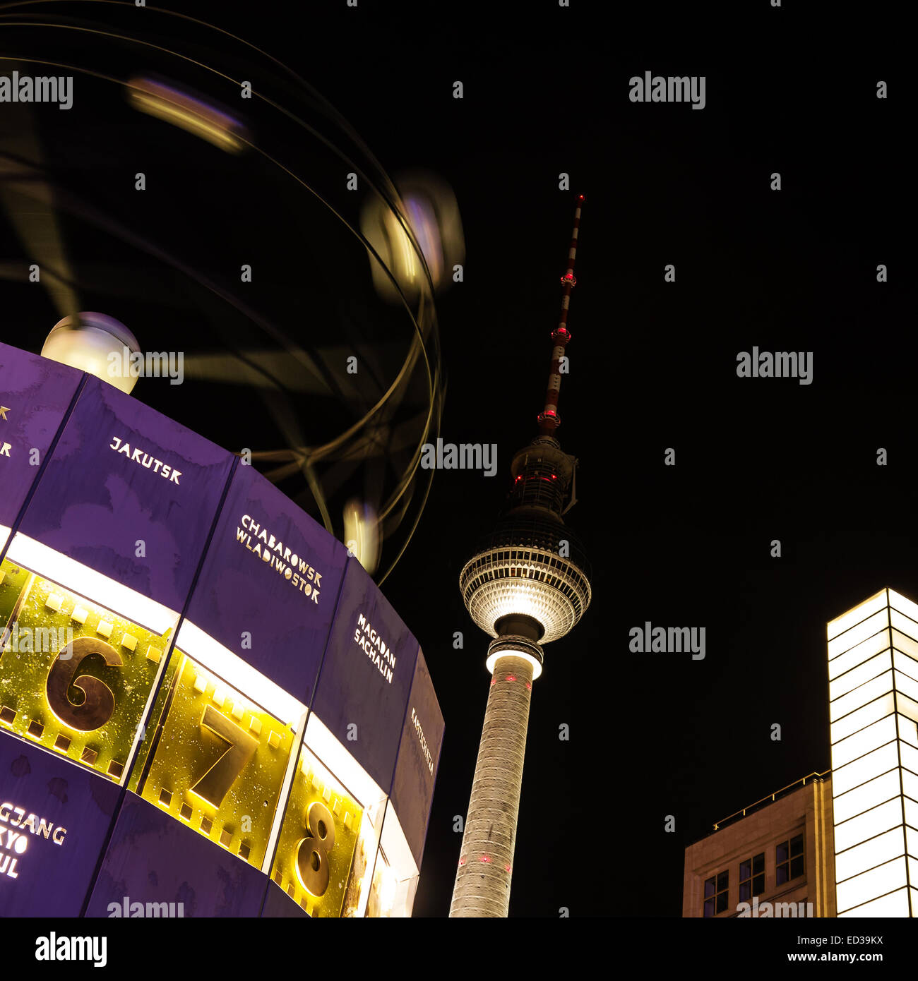World clock and tv tower in berlin by night Stock Photo