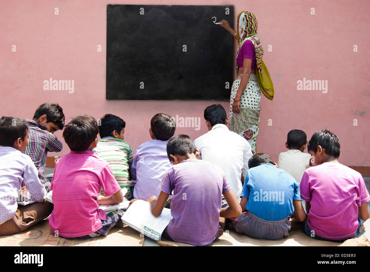 Indian rural teacher woman teaching hi-res stock photography and images ...