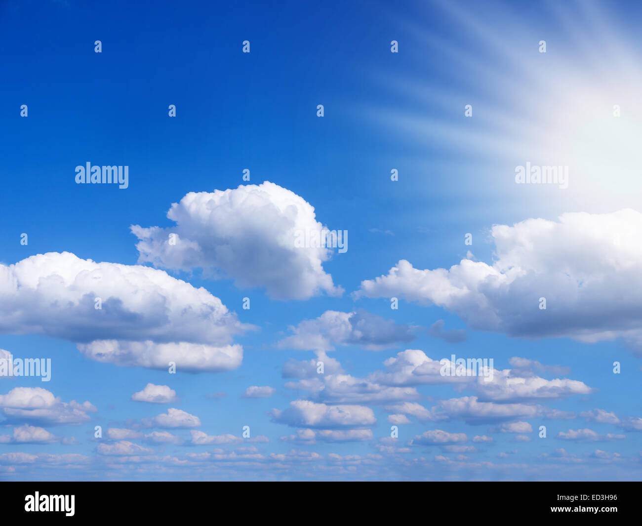 blue cloudy sky and sunlight in summer time Stock Photo