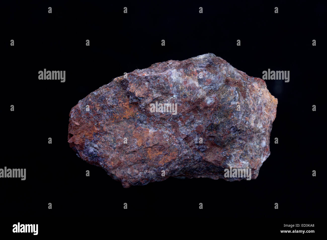 Rare earth element bearing minerals, Bastnesite,(Y), red, Allanite,black, Snowflake mine, Teller county, Colorado Stock Photo