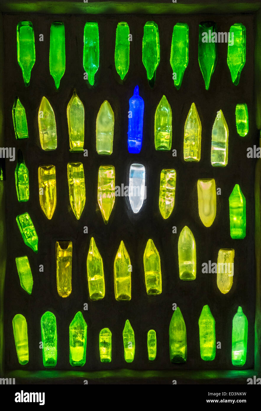 Hundertwasser Toilets of Kawakawa, New Zealand. Building detail. Colorful colourful window made with recycled glass bottles. Stock Photo