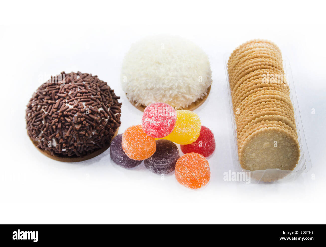 collection of delicious candies, biscuit and Cookies on a white background . Stock Photo