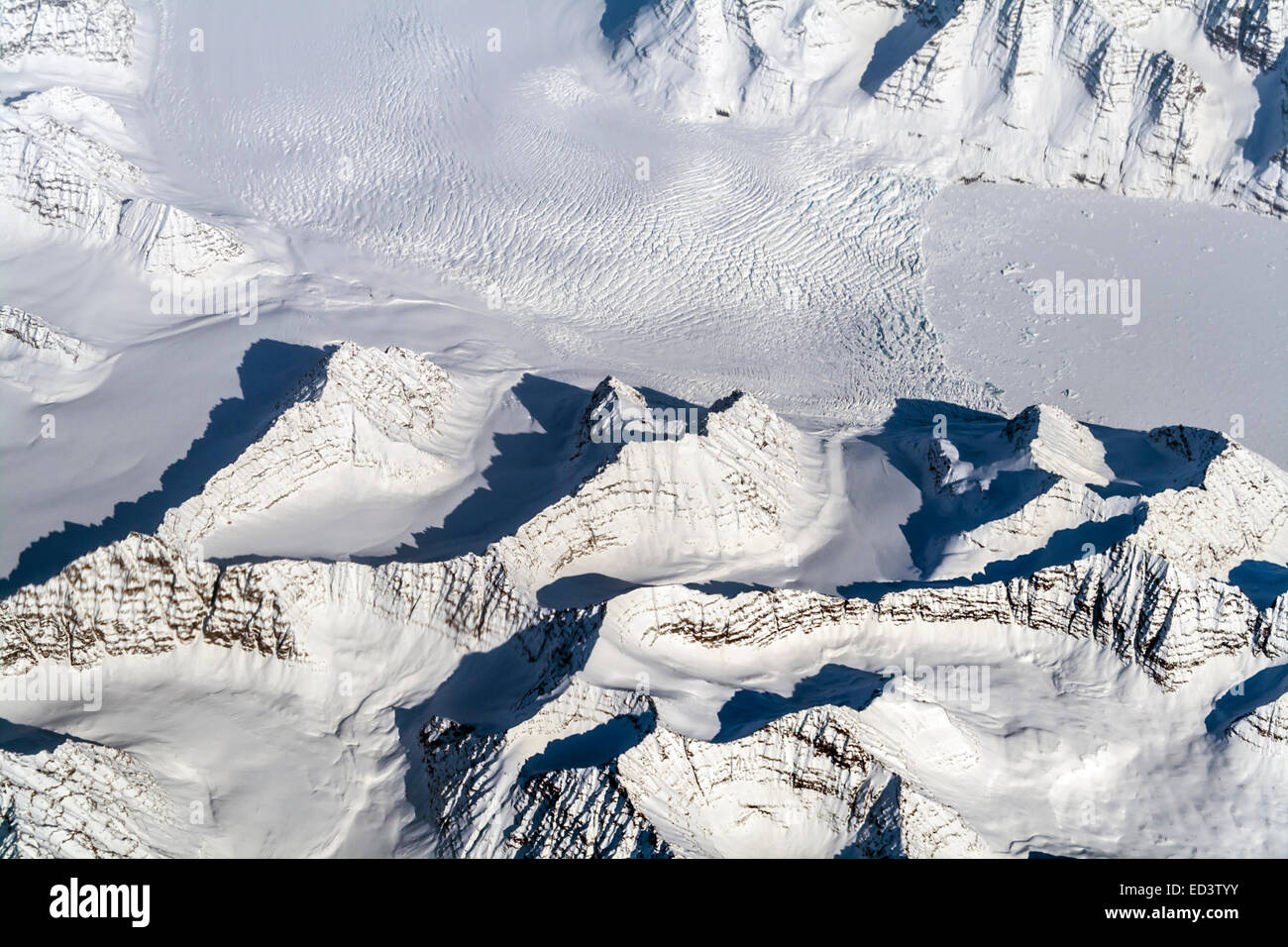 Aerial View of Greenland's Watkins Range Mountains and Glaciers Stock Photo