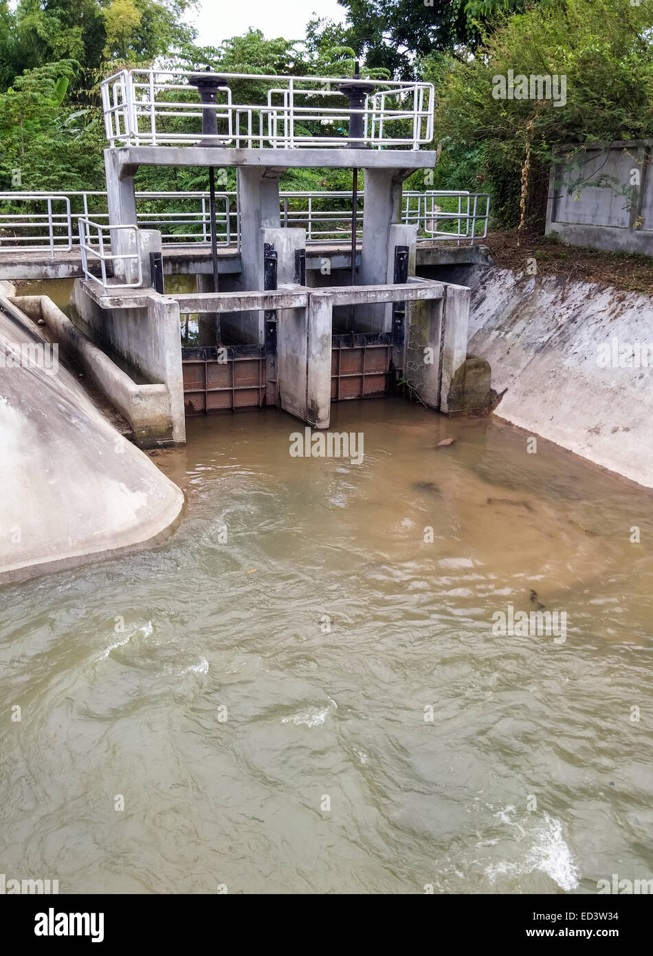 Small water gate for irrigation in the countryside Stock Photo Alamy