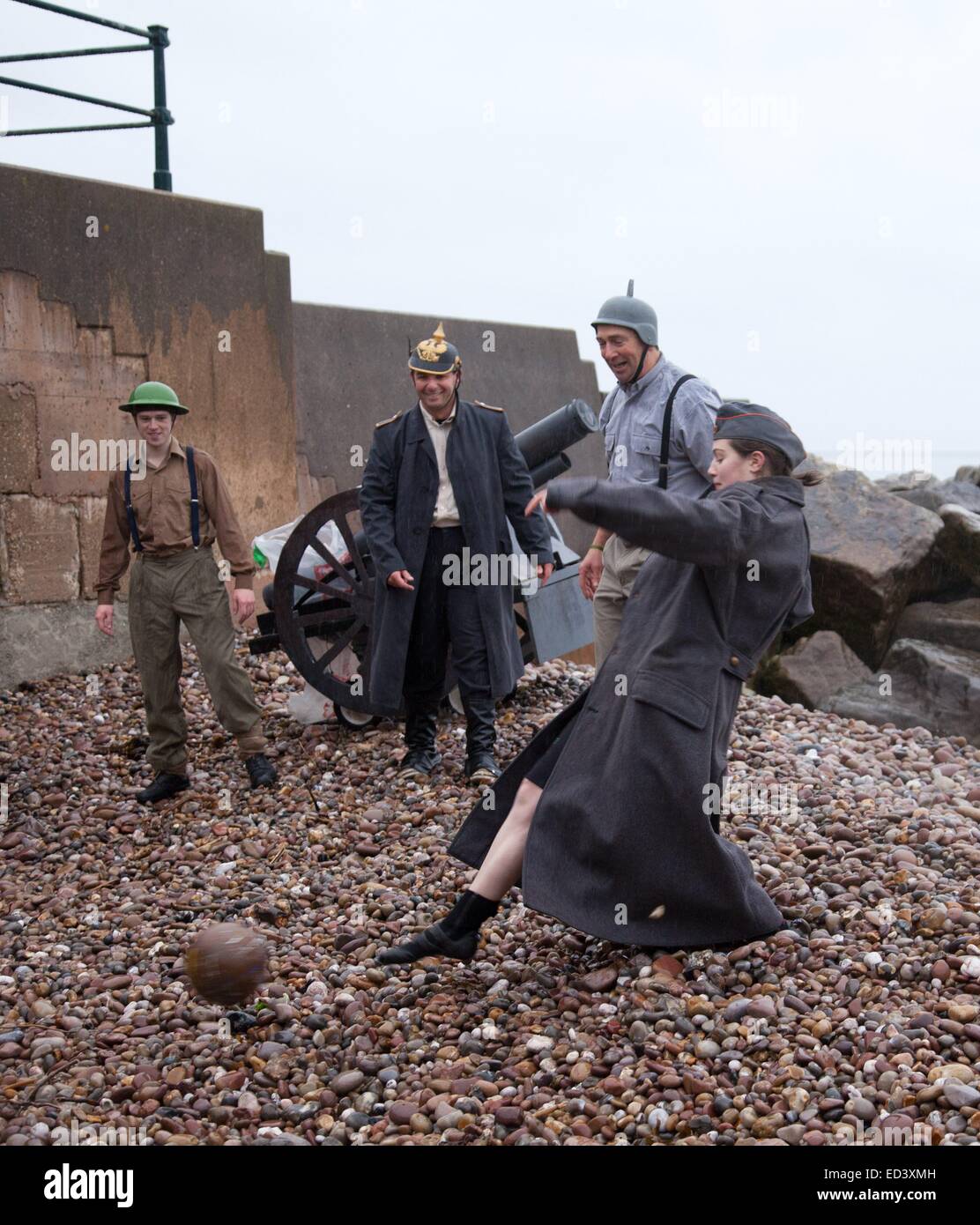 Sidmouth, Devon, UK. 26th December, 2014. WW1 England v Germany soccer match on the beach at Sidmouth, Devon  before the the annual Boxing Day Swim held to raise funds for the RNLI WORLD WAR 1 SOCCER MATCH. Credit:  Tony Charnock/Alamy Live News Stock Photo