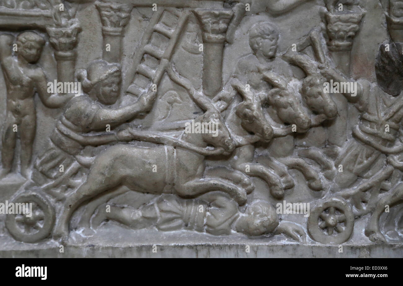 Roman art. Part of a front panel of a sarcophagus of a child with a chariot race in Circus Maximus. Marble. 130-192 century AD. Stock Photo
