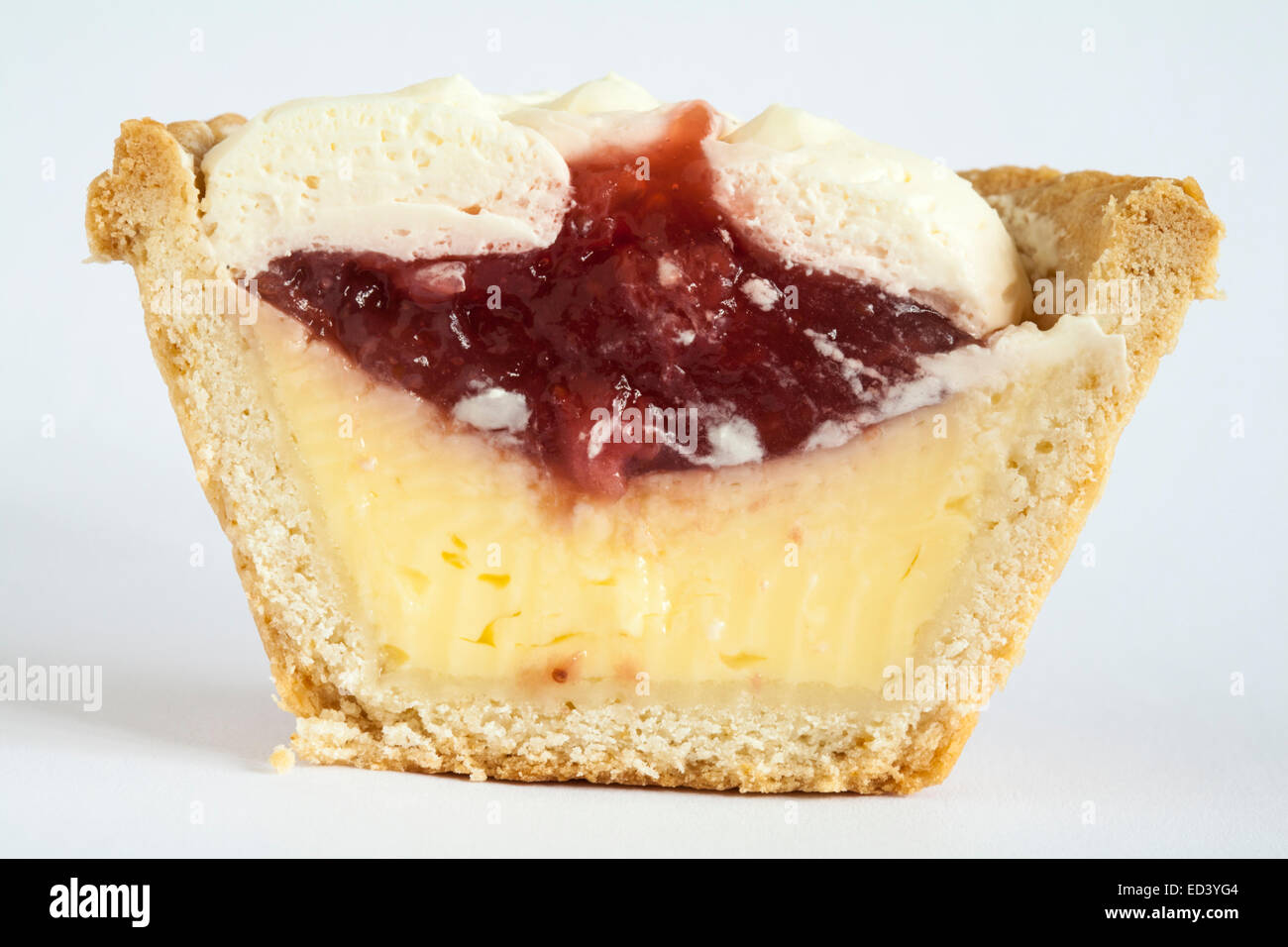 Tesco fresh Strawberry & Cream Custard Tart cut in half isolated on