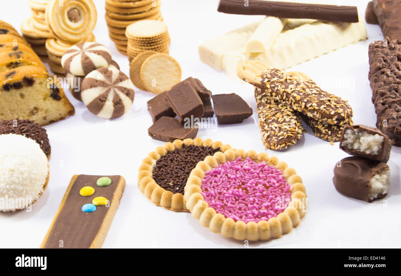 collection of delicious candies, biscuit and Cookies on a white background . Stock Photo