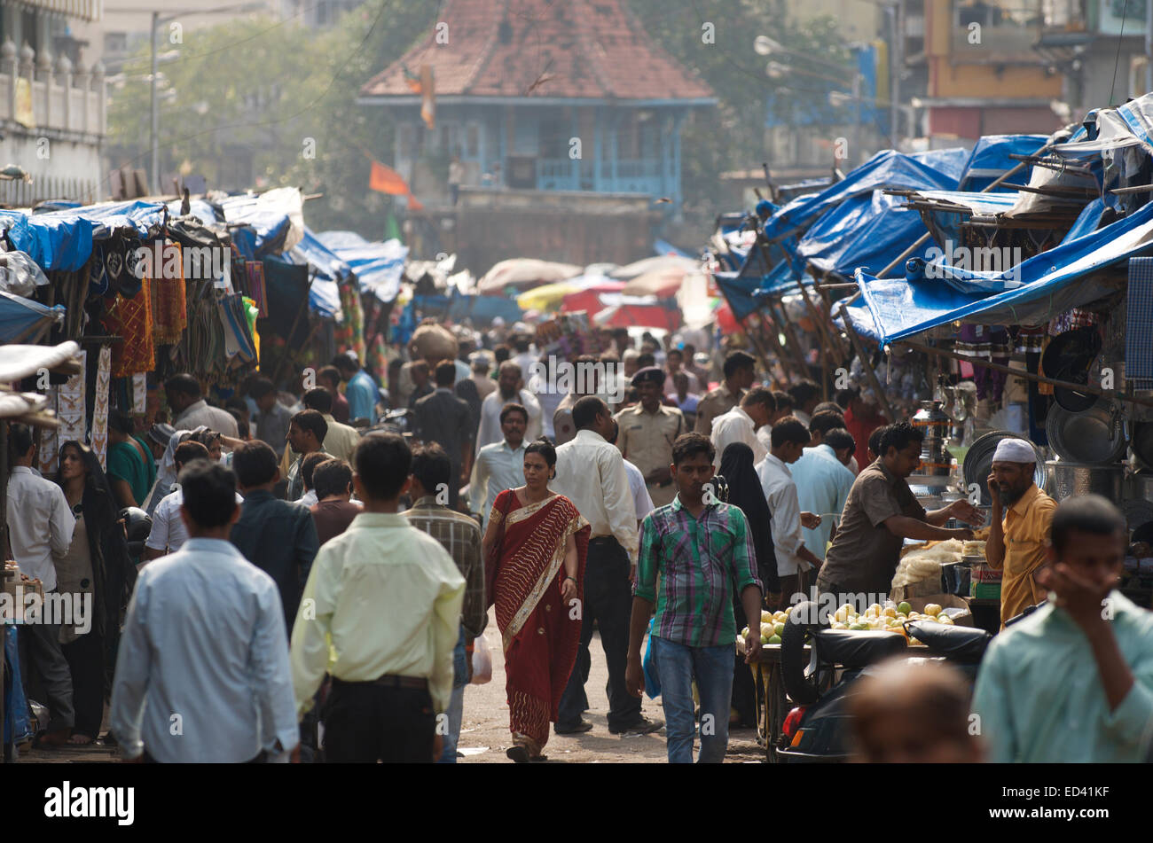 MUMBAI, INDIA - OCTOBER 26, 2012: Shoppers walk in a crowded outdoor market in the Null Bazar neighborhood in the city center. Stock Photo
