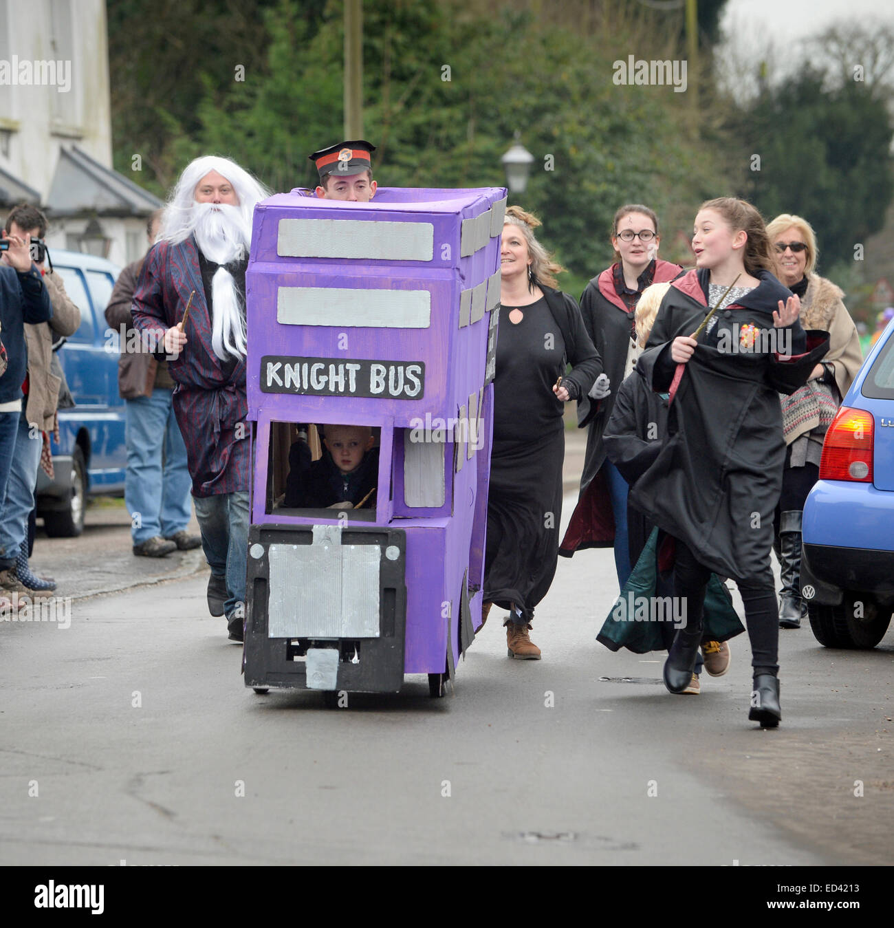 Lewes, UK. 26th Dec, 2014. Villagers competing in their annual Boxing Day Pram Race between the pubs in East Hoathly near Lewes East Sussex. Credit:  Jim Holden/Alamy Live News Stock Photo