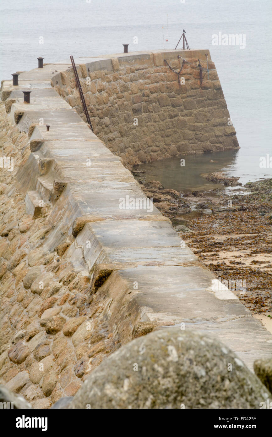 Curved sea wall at Sennen Cove, Cornwall, England Stock Photo Alamy