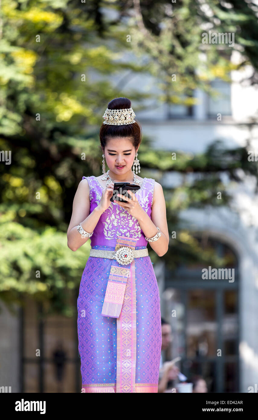 Thai woman wearing traditional attire Stock Photo - Alamy