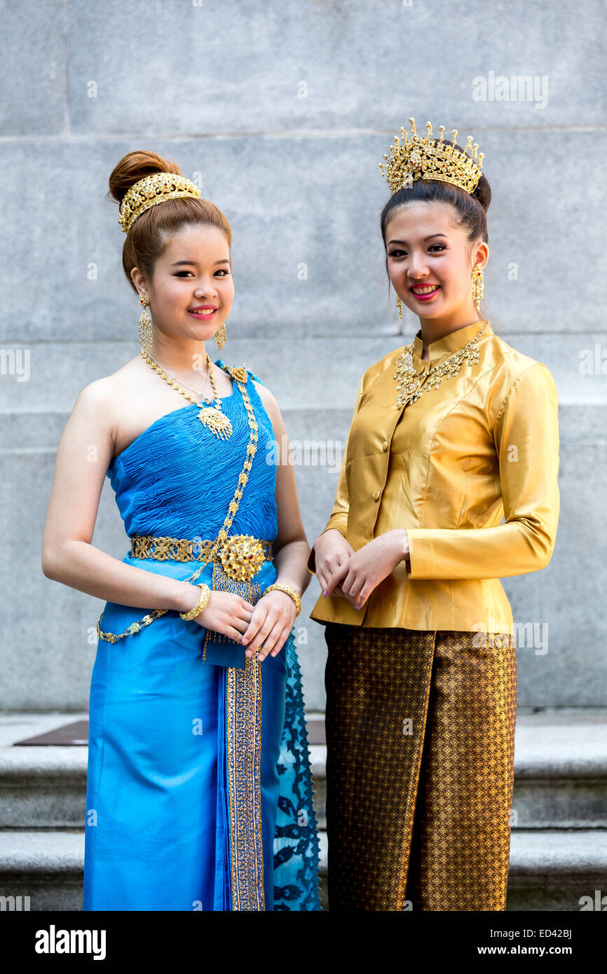 Thai women wearing traditional attire Stock Photo