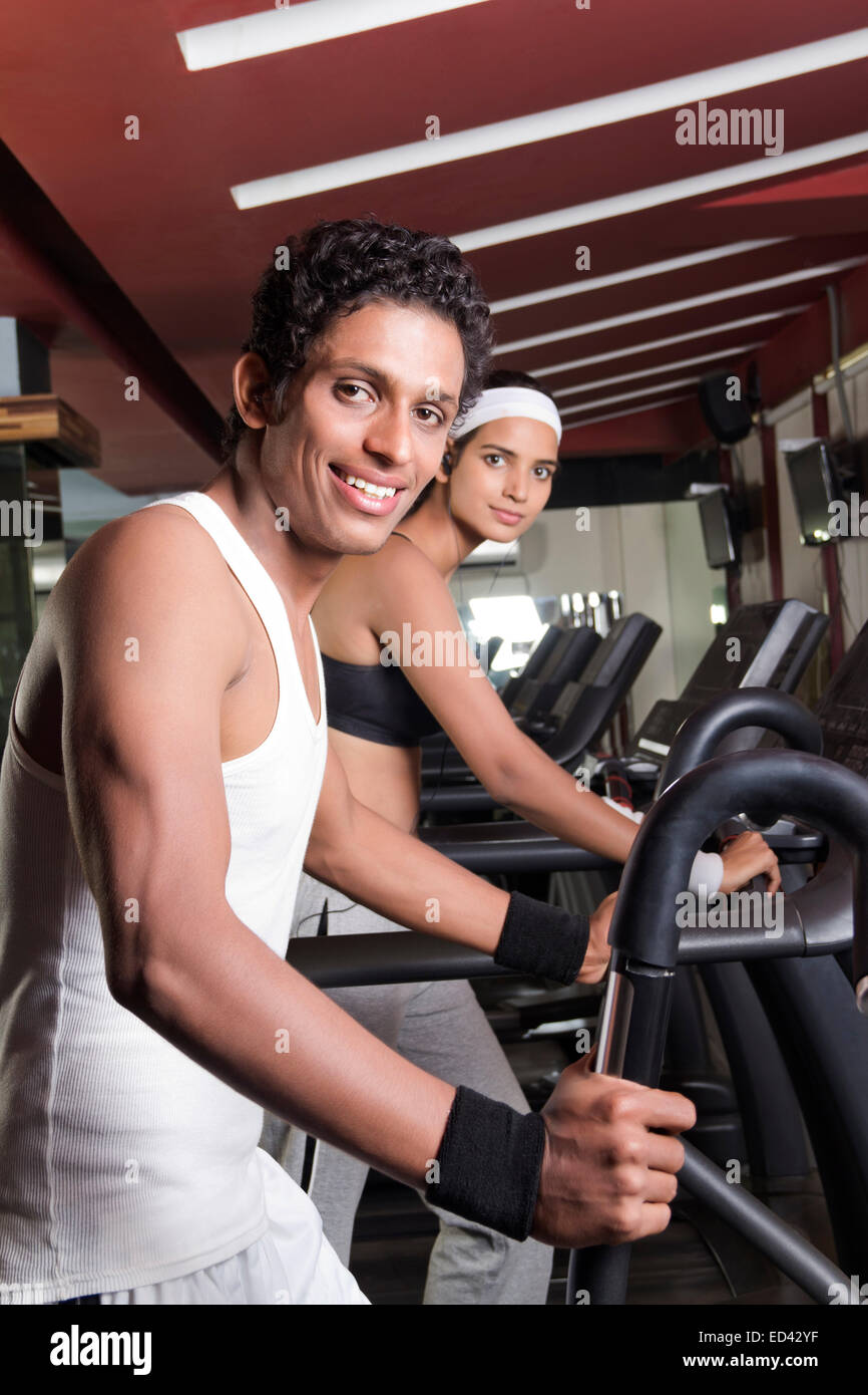2 indian sports person tread Mill  Running Stock Photo