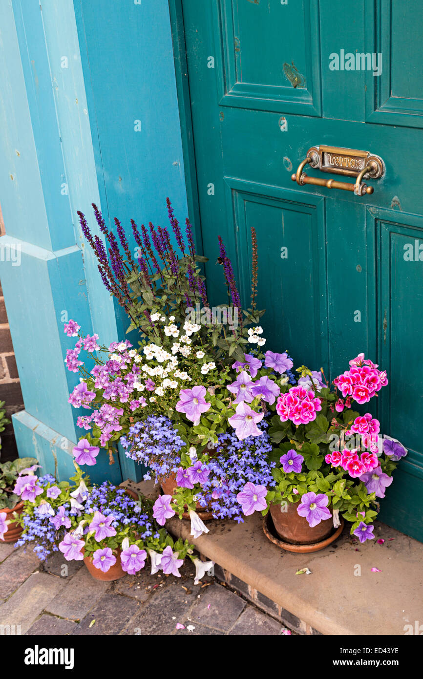 Flowers on pots on doorstep, Blists Hill Victorian town, Ironbridge, Shropshire, England, UK Stock Photo