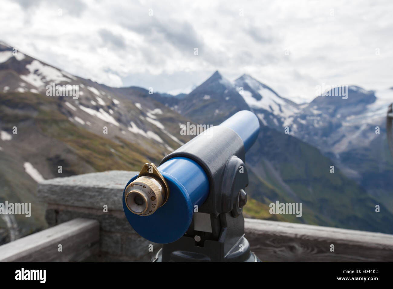 Looking at a high mountain peaks by telescope. Stock Photo
