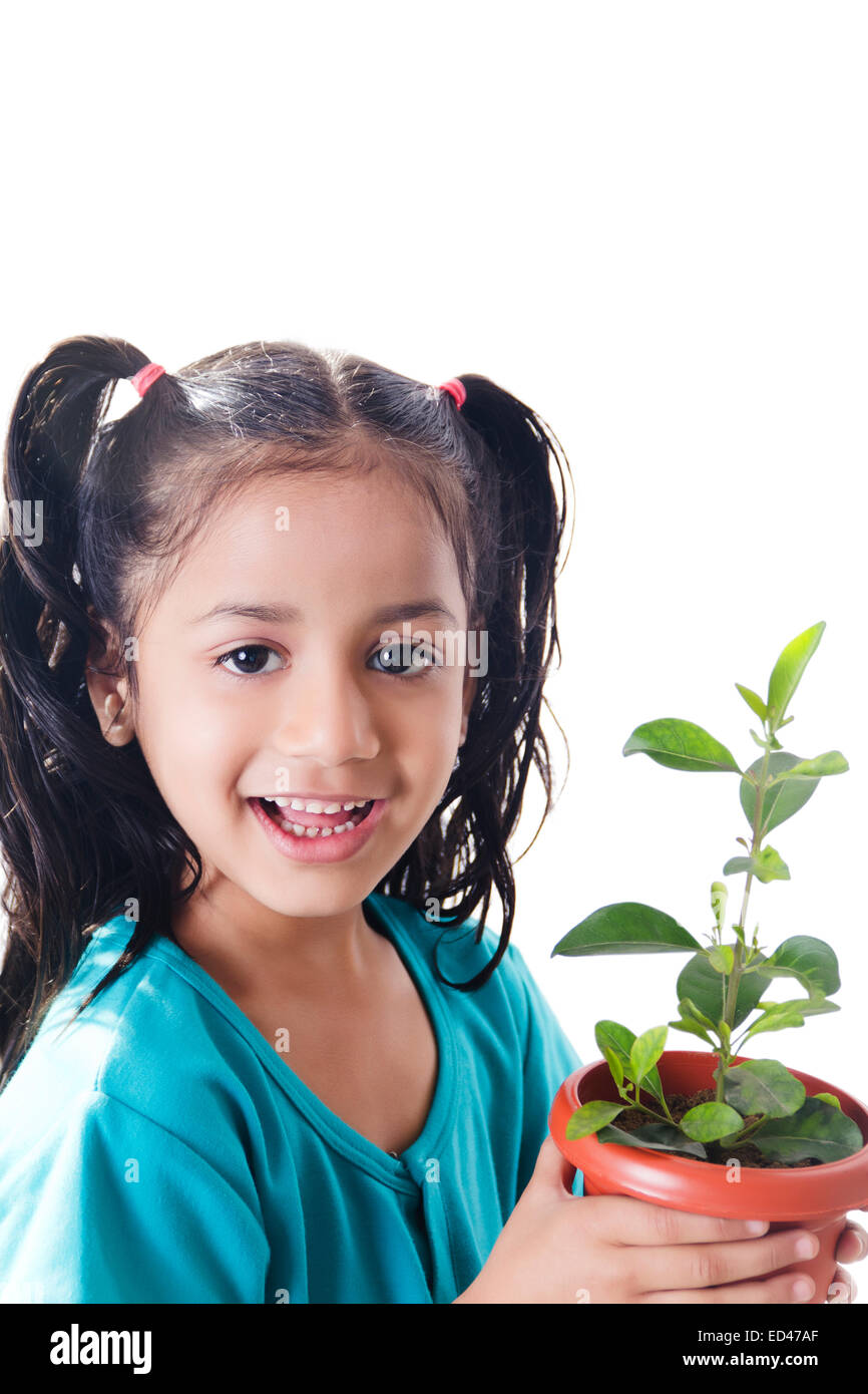 1 indian child girl Potted Plant care Stock Photo - Alamy