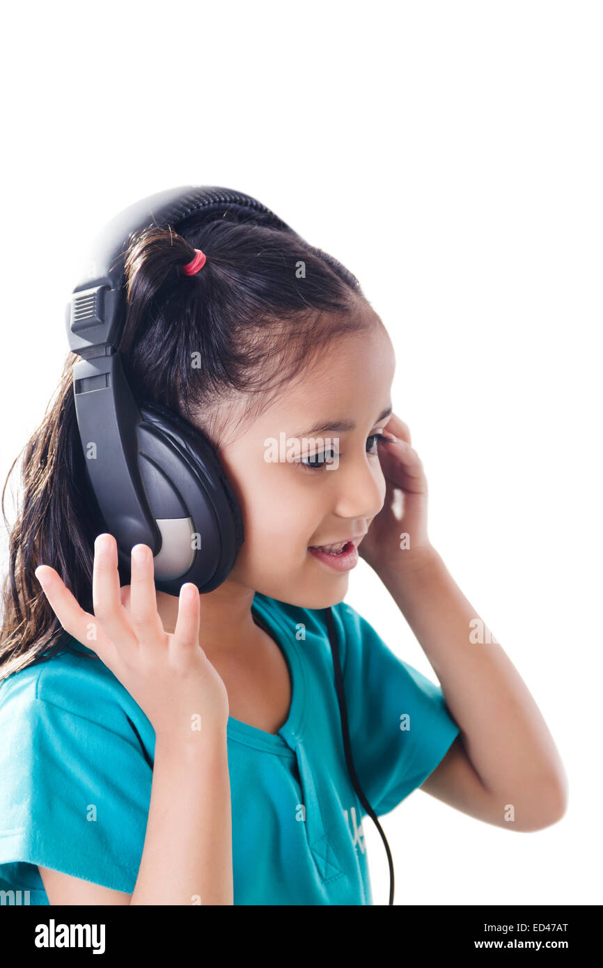 1 indian child girl Headphone Hearing music Stock Photo