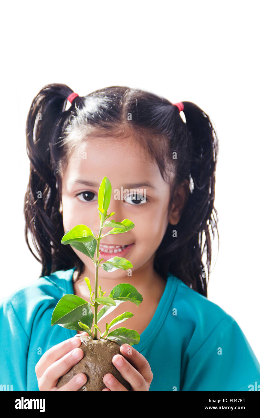Indian child girl plant care hi-res stock photography and images - Alamy