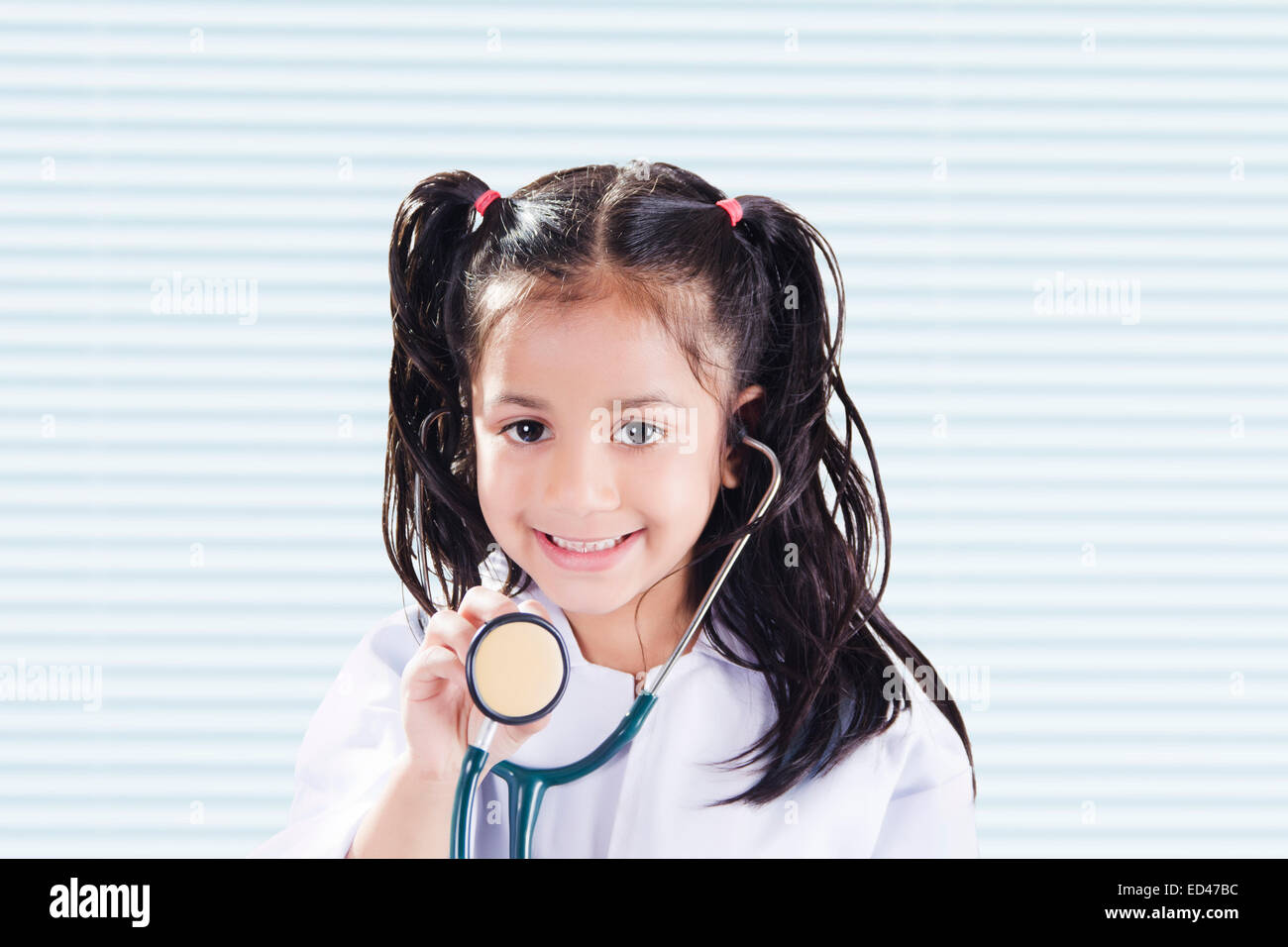 1 indian child girl Doctor Stock Photo - Alamy