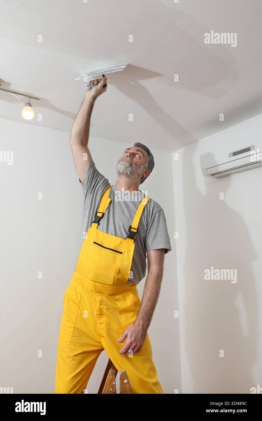 Spreading Plaster Ceiling Trowel Repairing Stock Photos