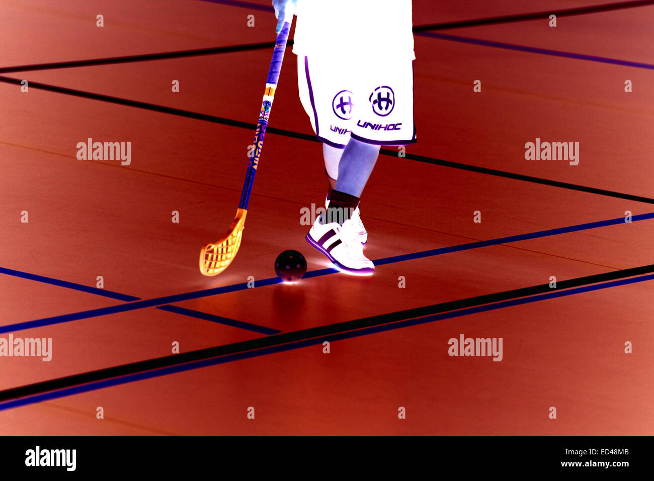 Children boys schoolchildren playing floorball (floor hockey) match in