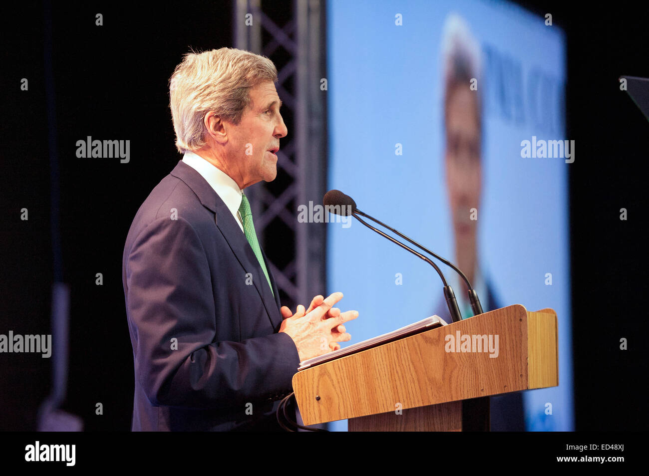U.S. Secretary of State John Kerry addresses the 20th session of the Conference of the Parties to the United Nations Framework Convention on Climate Change in Lima, Peru, on December 11, 2014, before meeting with Peruvian President Ollanta Humala. Stock Photo