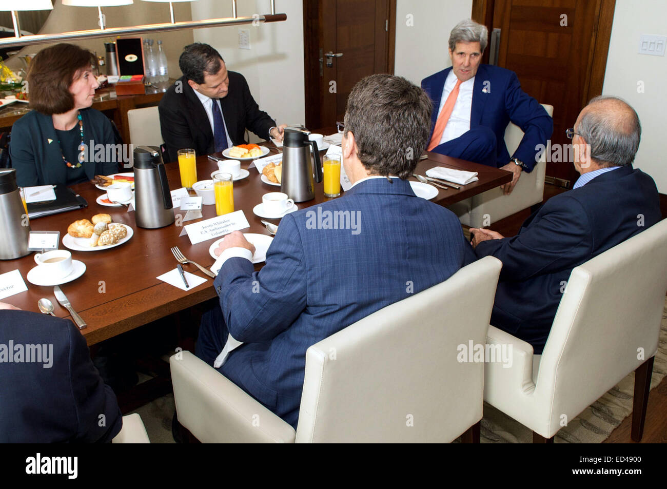 U.S. Secretary of State John Kerry, joined by U.S. Ambassador to Colombia Kevin Whitaker and U.S. Assistant Secretary of State for Western Hemispheric Affairs Roberta Jacobson, meets with Colombian lead negotiator Humberto de la Calle, right, and High Commissioner for Peace Sergio Jaramillo, left, on December 12, 2014, in Bogota, Colombia, to receive an update about their efforts to negotiate a peace treaty FARC rebels. Stock Photo