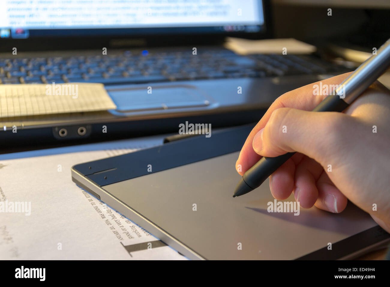 Close-up of a graphic tablet with his pen tool Stock Photo