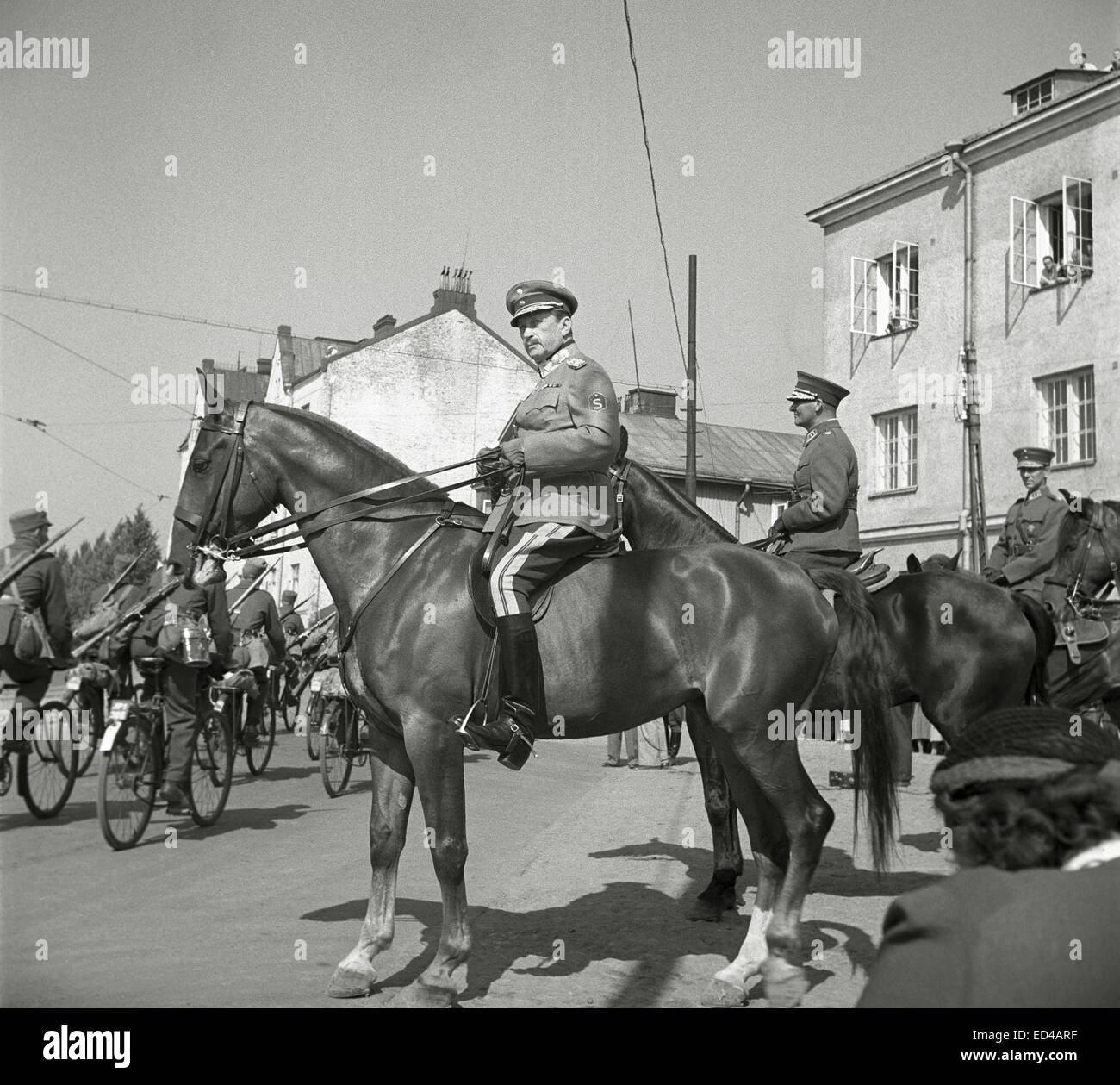 Commander-in-chief, Marshal Carl Gustav Mannerheim reviewing the parade troops Stock Photo