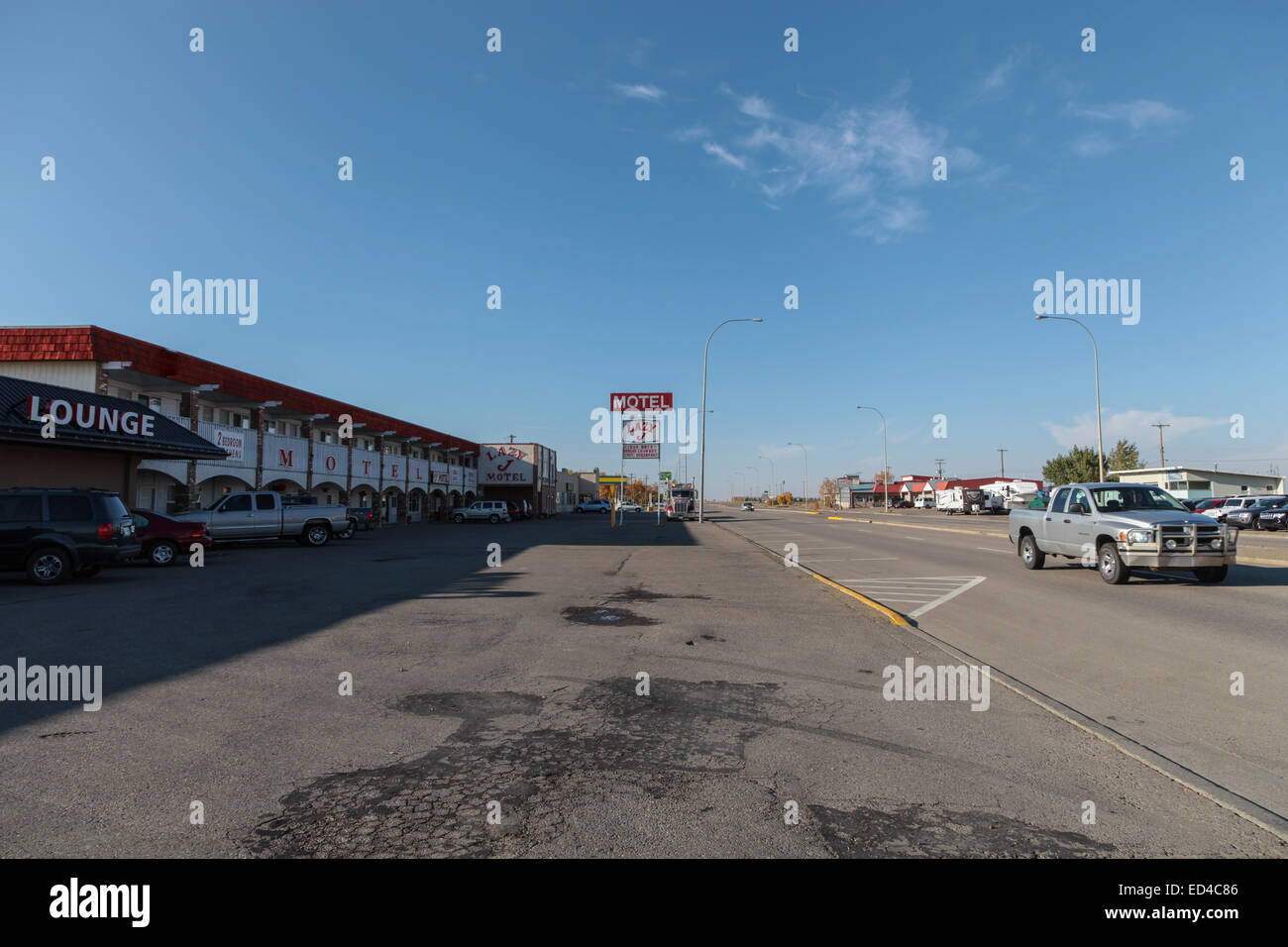 Parking lot of the Lazy J Motel on highway 2 in Claresholm, Alberta
