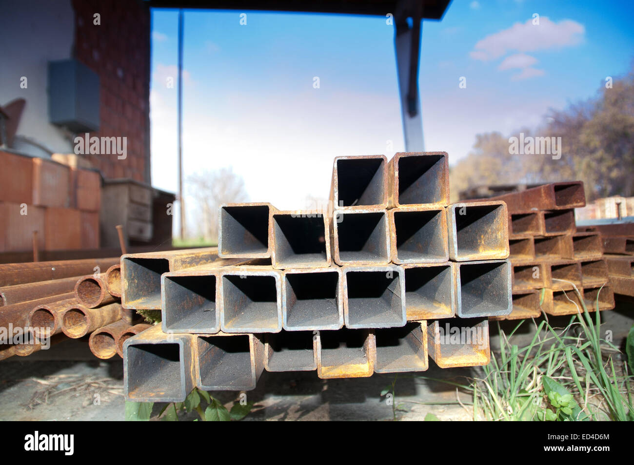 Various metal profiles stacked in warehouses. Stock Photo