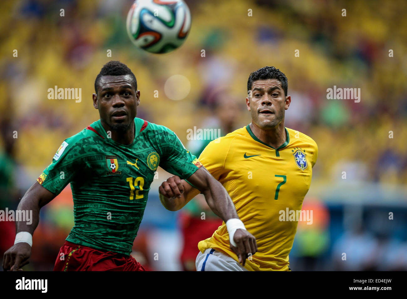 2014 FIFA World Cup - Group A - Cameroon v Brazil (1-4) at National Mane Garrincha Stadium  Featuring: Henri Bedimo,Hulk Where: Brasilia, Brazil When: 23 Jun 2014 Stock Photo