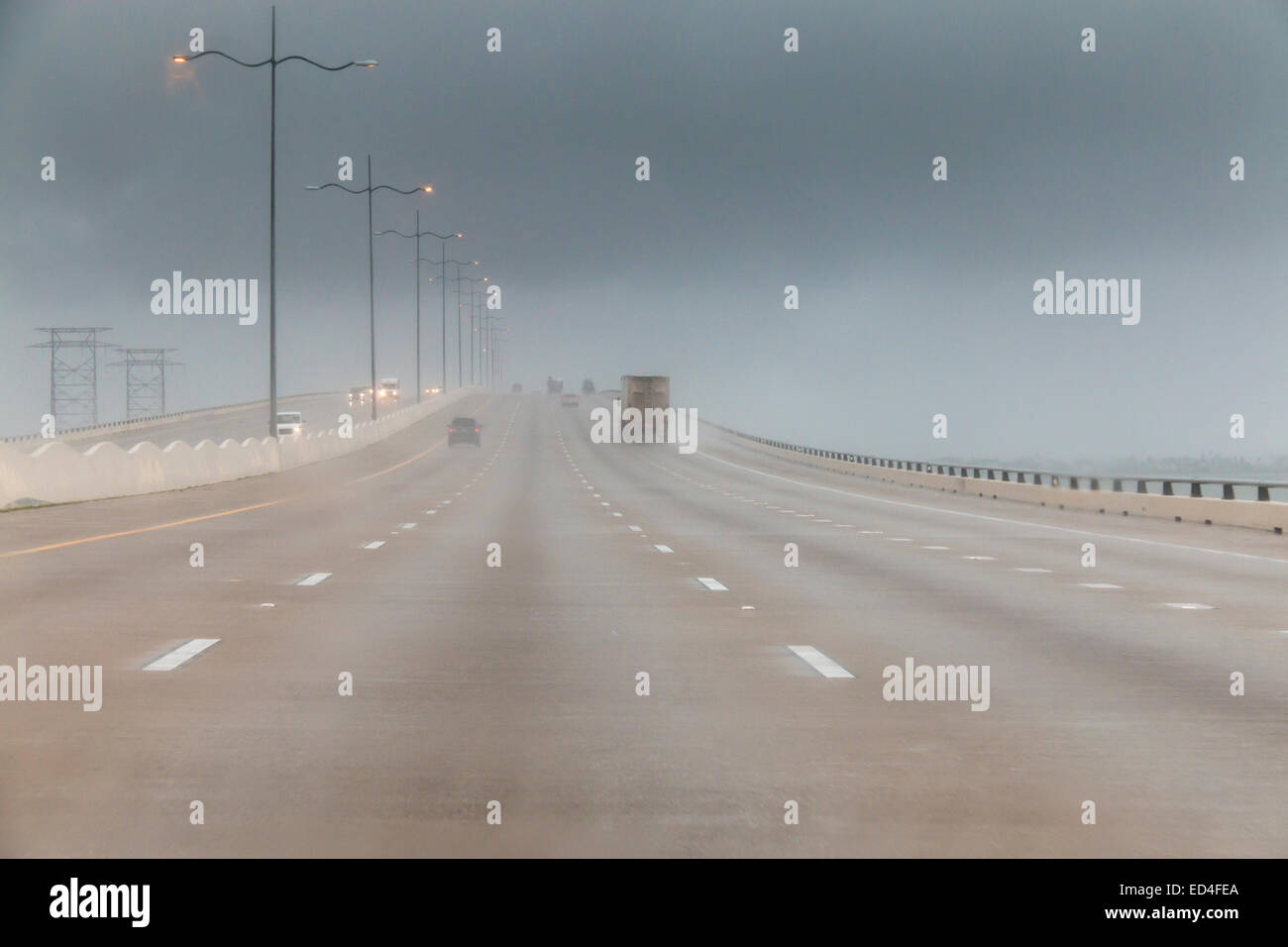 Galveston Island Causeway in rain and fog. Stock Photo