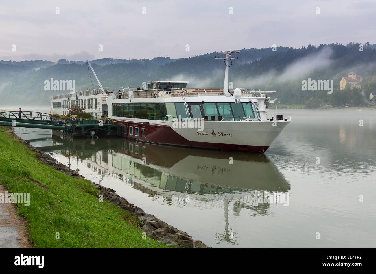 Bow of Sound of Music river cruise boat on Danube at dusk in Aschach an der Donau, Austria Stock Photo