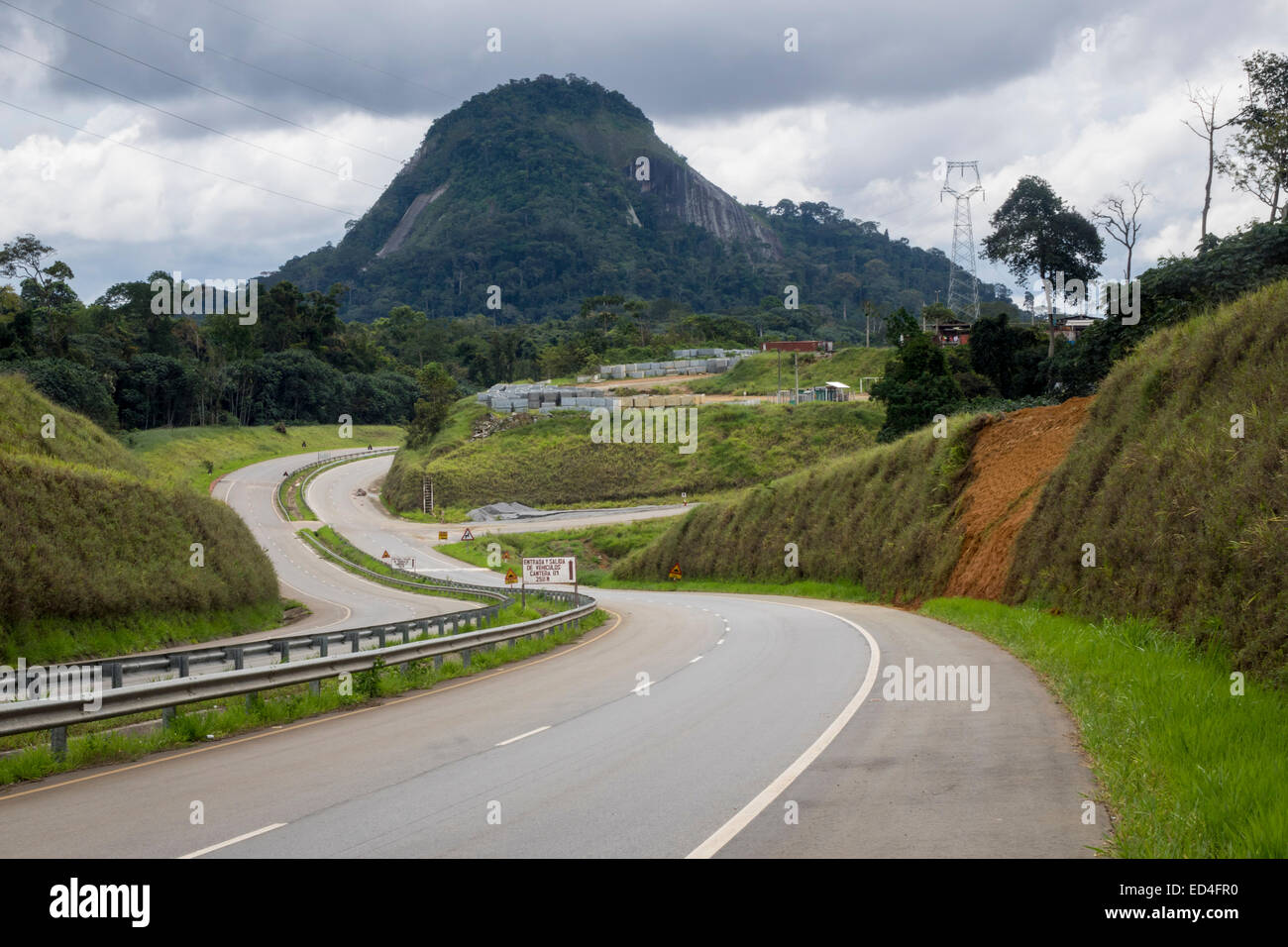 Dual carriageway modern highway past distinctive mountain on way to the ...