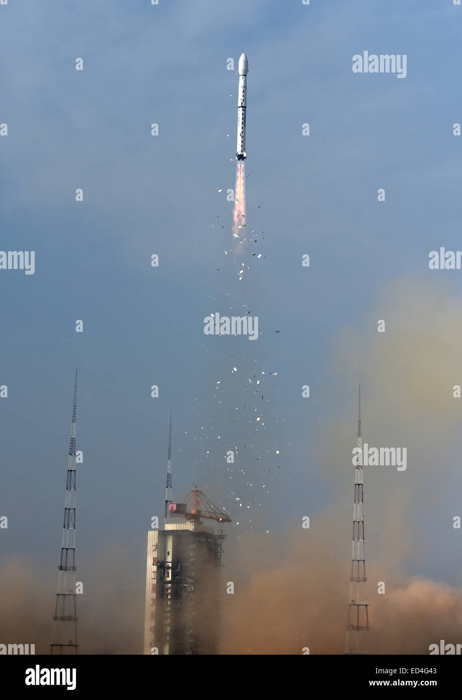 Taiyuan, China's Shanxi Province. 27th Dec, 2014. A Long March-4B rocket carrying the Yaogan-26 remote sensing satellite blasts off from the launch pad at the Taiyuan Satellite Launch Center in Taiyuan, capital of north China's Shanxi Province, Dec. 27, 2014. Yaogan satellites are mainly used for scientific experiments, natural resource surveys, crop yield estimates and disaster relief. Credit:  Yan Yan/Xinhua/Alamy Live News Stock Photo