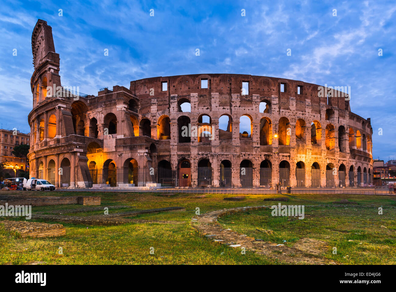 Colosseum, Italy. Twilight view of Colosseo in Rome, elliptical largest amphitheatre of Roman Empire ancient civilization. Stock Photo