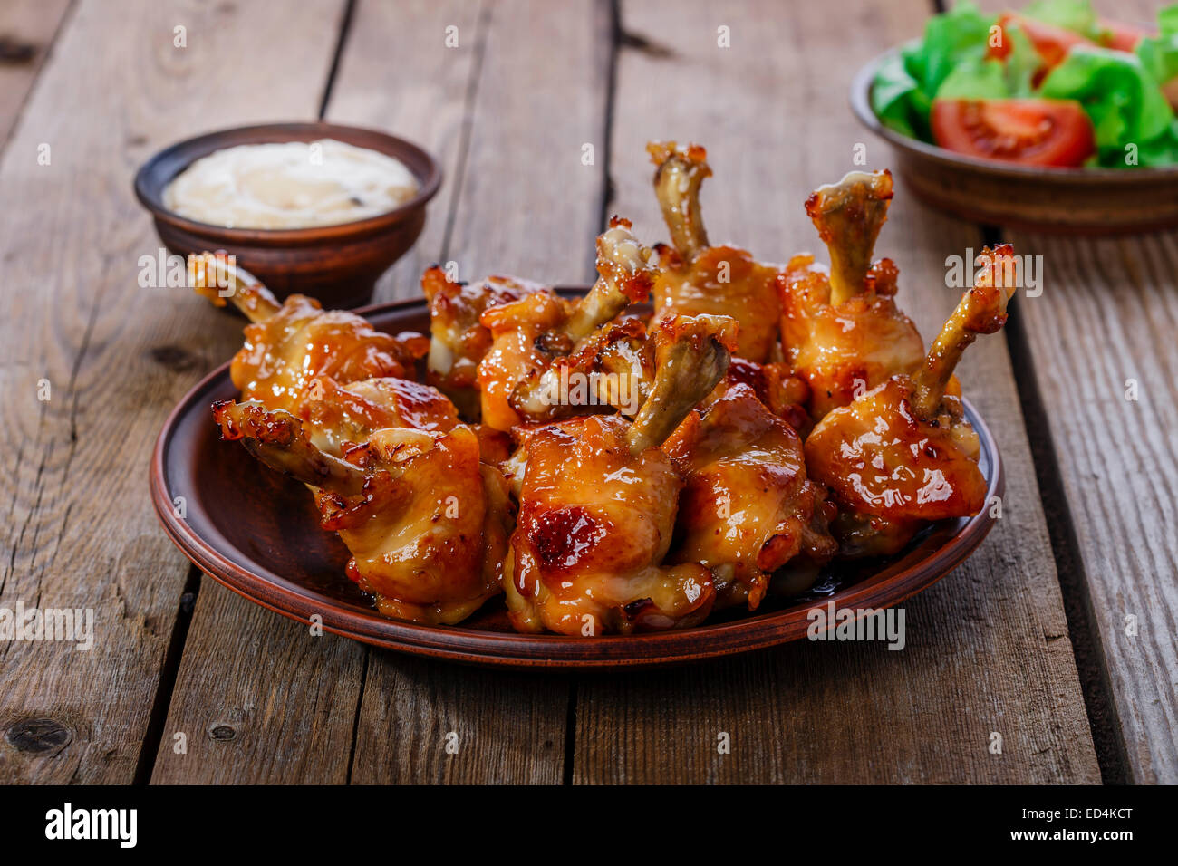 honey glazed chicken wing with sauce Stock Photo