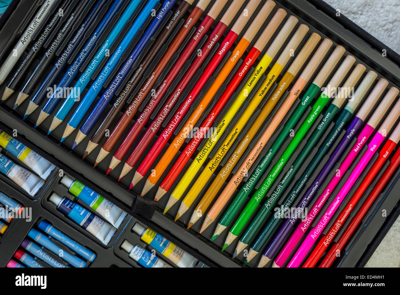 box of artist pencils and paints Stock Photo Alamy